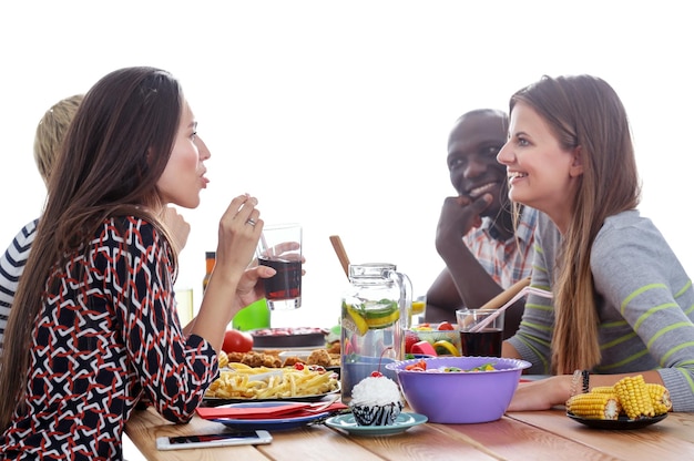 Smiling people sharing a meal